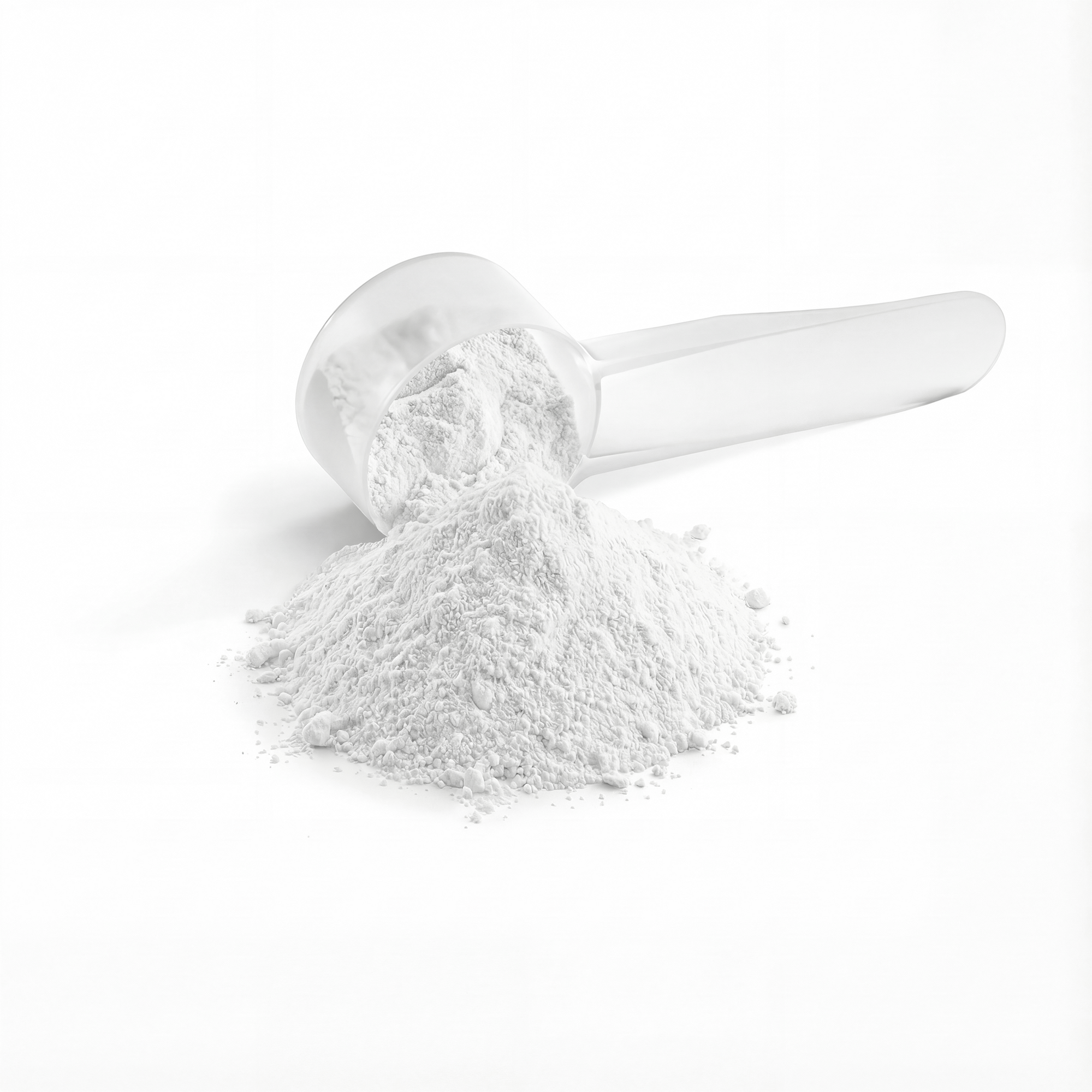 Clear plastic scoop with white powder on a white background