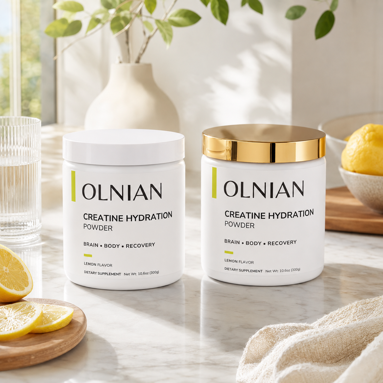 Two OLNIAN Creatine Hydration Powder supplement jars on a marble countertop with lemon slices, a glass of water, and a vase in the background.