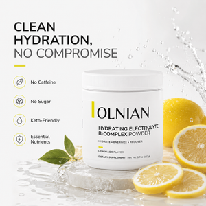 A white tub of OLNIAN Hydrating Electrolyte B-Complex Powder is shown on a marble slab with lemon slices and water splashes, alongside marketing text highlighting no caffeine, no sugar, keto-friendly, and essential nutrients.